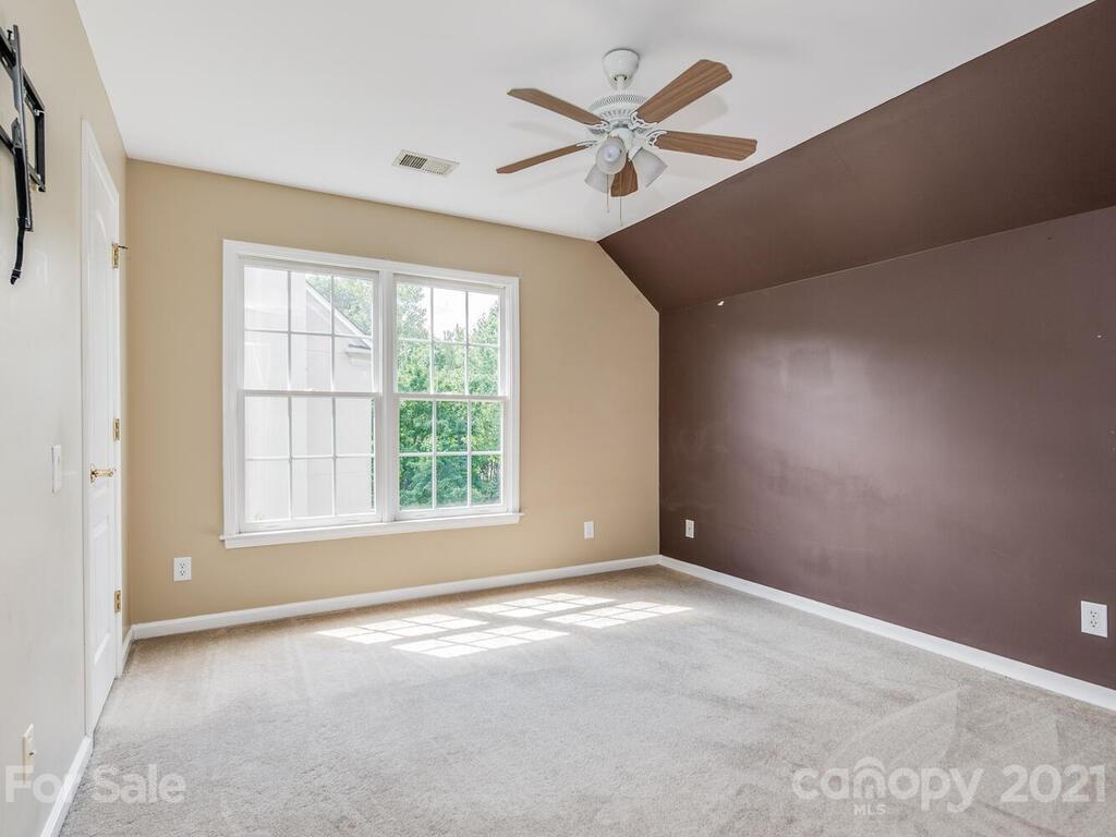 5530 Piper Glen Drive Charlotte, NC 28277 - Photo 27 of 35 an empty room with a window