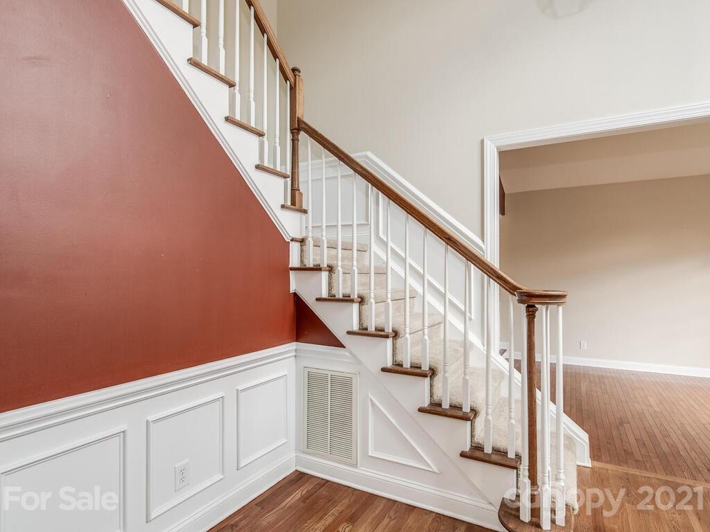 5530 Piper Glen Drive Charlotte, NC 28277 - Photo 4 of 35 a view of entryway and hall with wooden floor