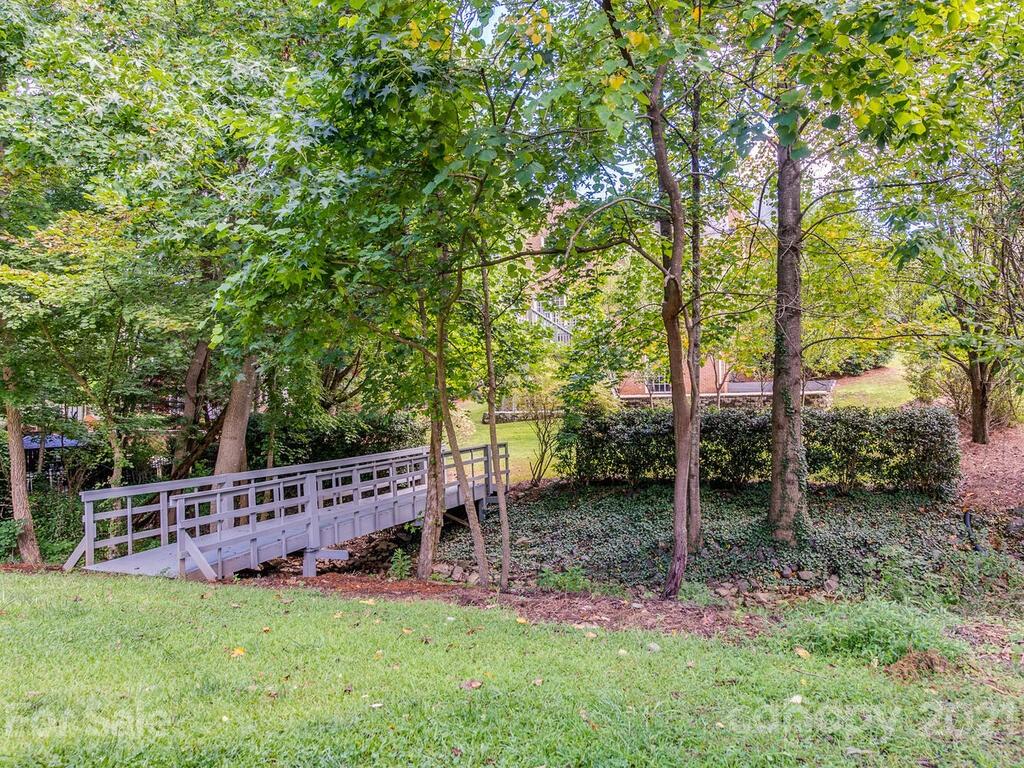 5530 Piper Glen Drive Charlotte, NC 28277 - Photo 34 of 35 a view of an house with backyard space and deck