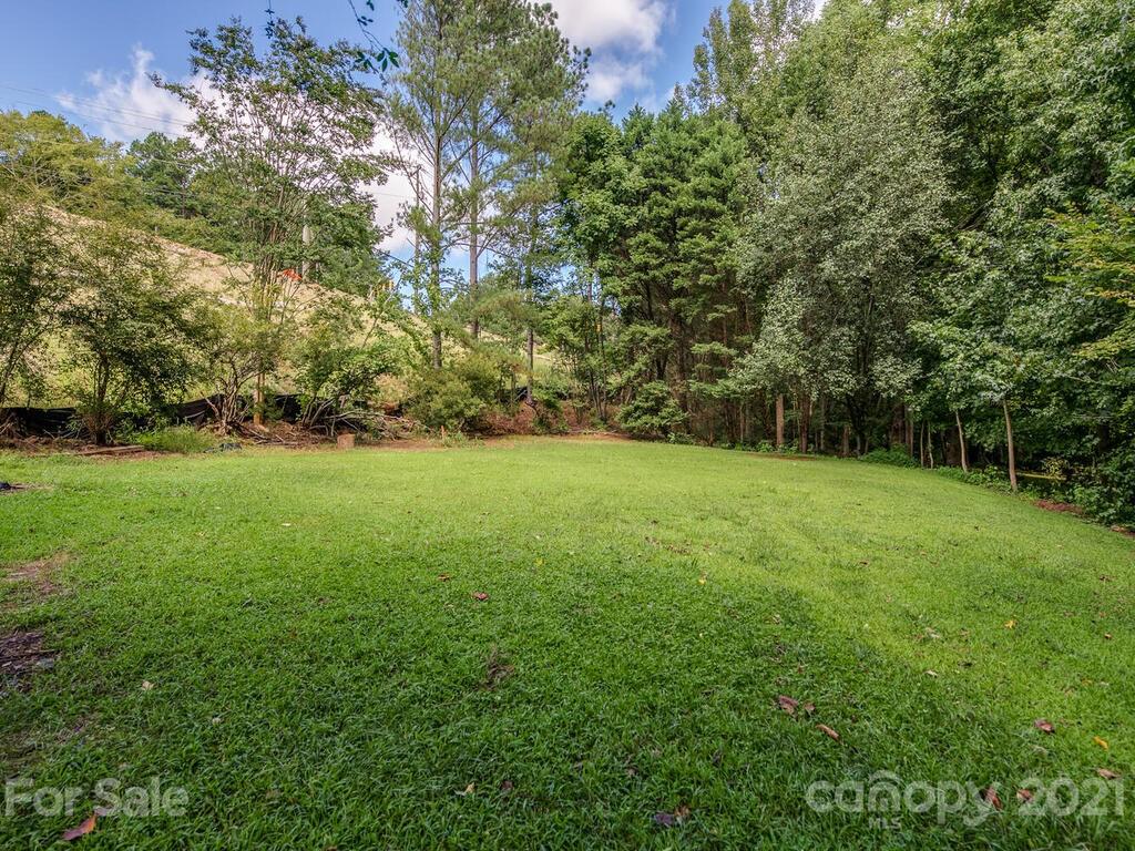 5530 Piper Glen Drive Charlotte, NC 28277 - Photo 35 of 35 a view of a green field with trees