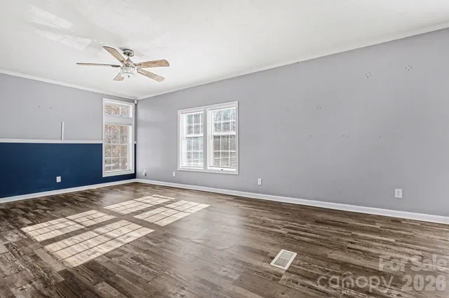 a view of a livingroom with a kitchen