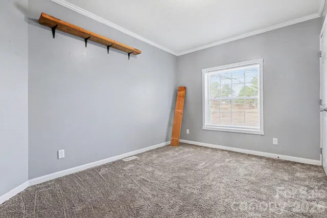 a view of a room with a window