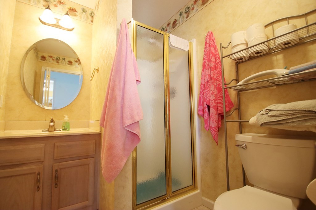 154 Charleston Road Cookeville, TN 38506 - Photo 17 of 23 a bathroom with a sink a toilet and a mirror
