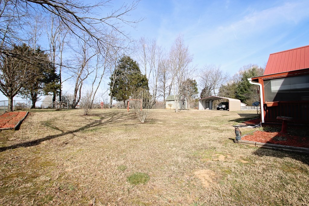 154 Charleston Road Cookeville, TN 38506 - Photo 19 of 23 a view of road with large trees