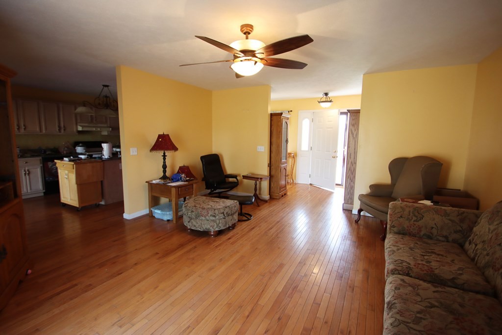 154 Charleston Road Cookeville, TN 38506 - Photo 8 of 23 a living room with furniture and wooden floors