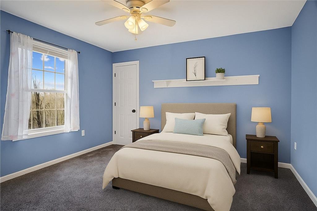 90 Coffeys Crossing Road Washington, PA 15301 - Photo 16 of 50 a bedroom with bed and a night stand
