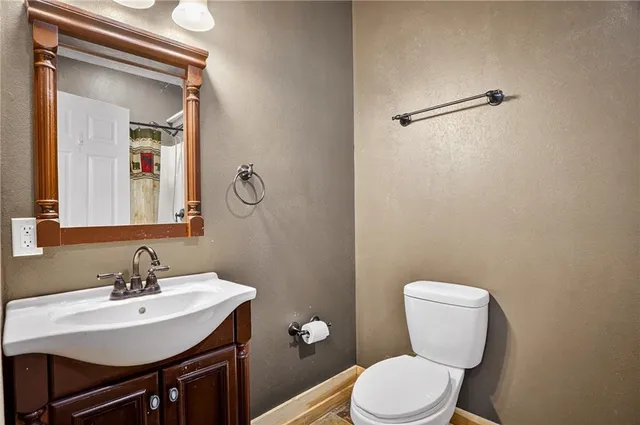 a view of a bathroom with a tub and shower