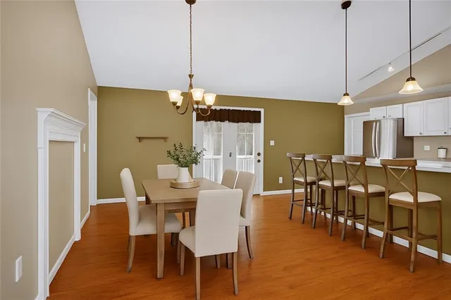 a view of a dining room with furniture