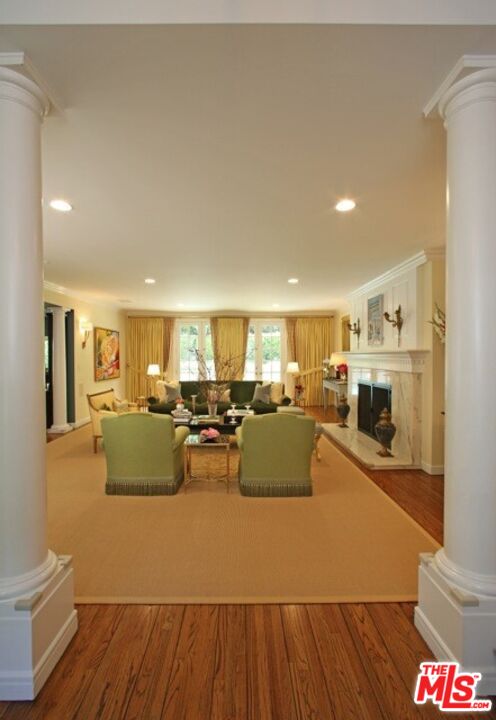 914 Chantilly Road Los Angeles, CA 90077 - Photo 7 of 25 a living room with furniture and a flat screen tv