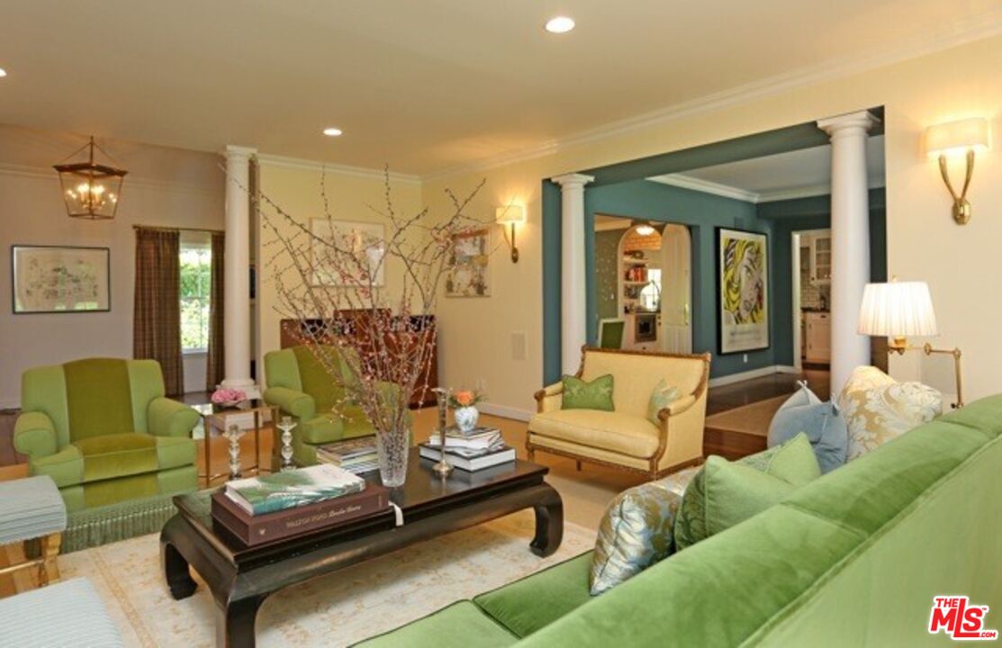 914 Chantilly Road Los Angeles, CA 90077 - Photo 10 of 25 a living room with furniture and a large window