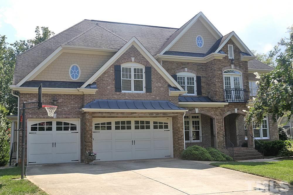 5214 Landguard Drive Raleigh, NC 27613 - Photo 2 of 20 a front view of a house with a yard