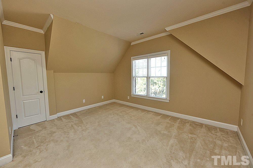 5214 Landguard Drive Raleigh, NC 27613 - Photo 14 of 20 an empty room with windows