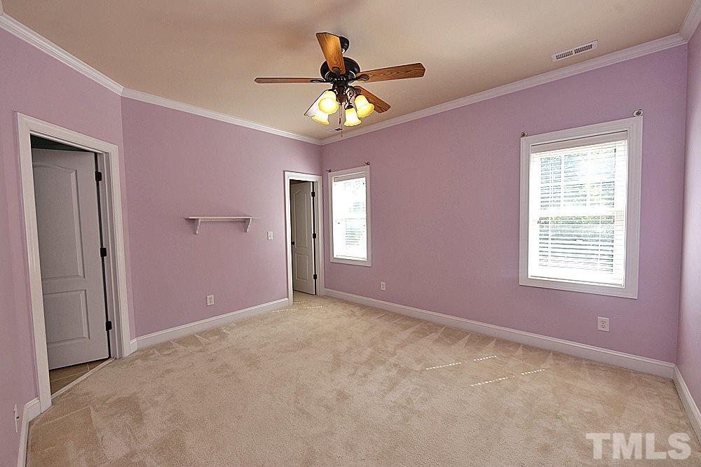 5214 Landguard Drive Raleigh, NC 27613 - Photo 15 of 20 a view of an empty room with a window