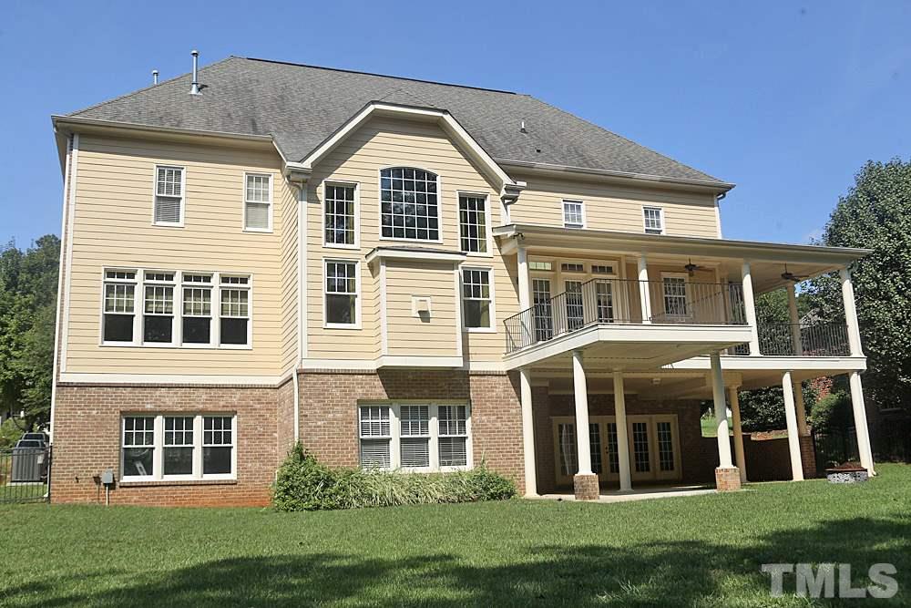 5214 Landguard Drive Raleigh, NC 27613 - Photo 19 of 20 a front view of a house with a yard