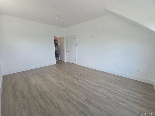 an empty room that has a window