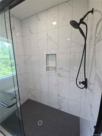 a view of a room with racks on the wall