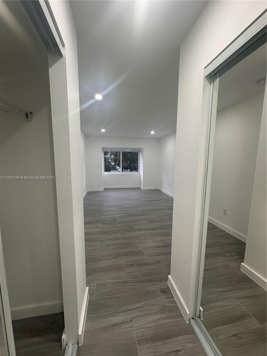 7705 Southwest 86th Street, Unit B315 Miami, FL 33143 - Photo 15 of 28 a view of entryway with wooden floor