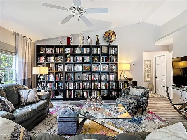 a living room with furniture and a window