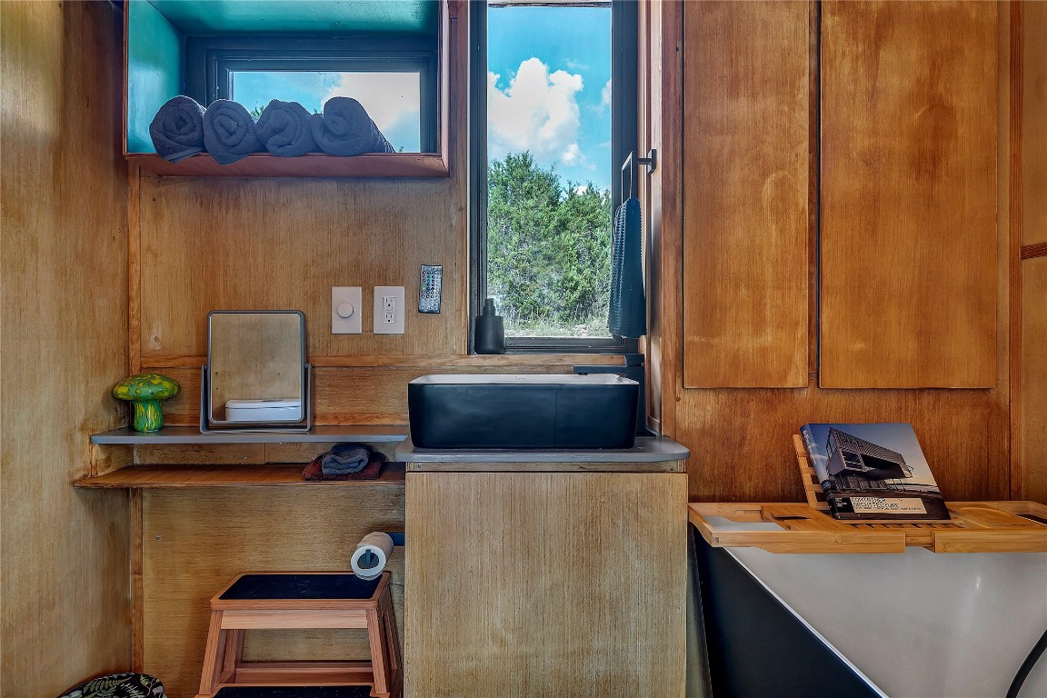199 High Point Drive Kempner, TX 76539 - Photo 10 of 38 a kitchen with a refrigerator a stove top oven a sink and a potted plant