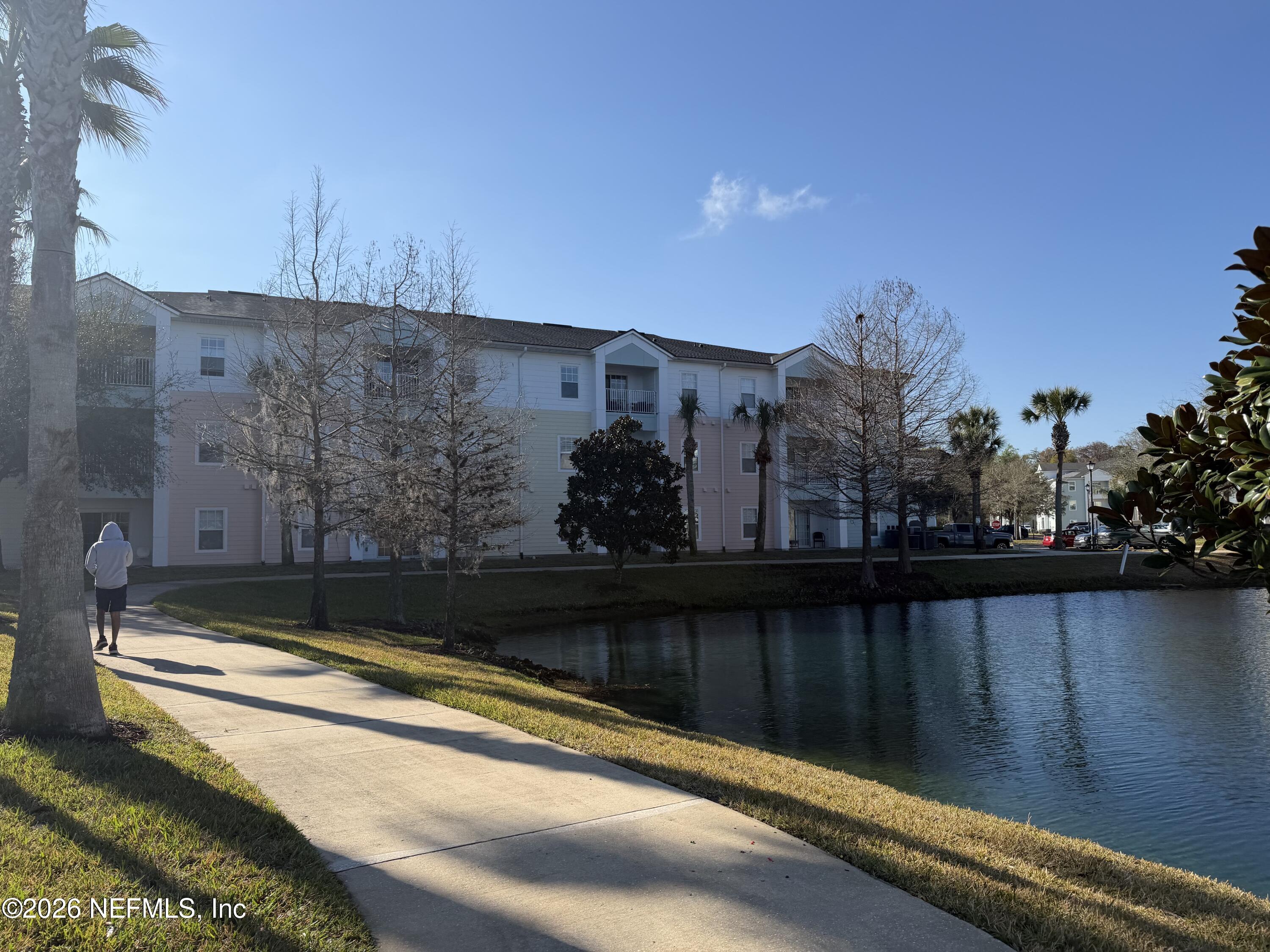 8218 Green Parrot Road, Unit 308 Jacksonville, FL 32256 - Photo 25 of 27 a view of swimming pool from a balcony