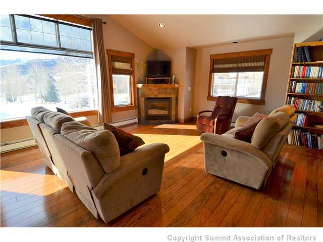 414 Big Elk Road Dillon, CO 80435 - Photo 2 of 25 a living room with furniture window and wooden floor