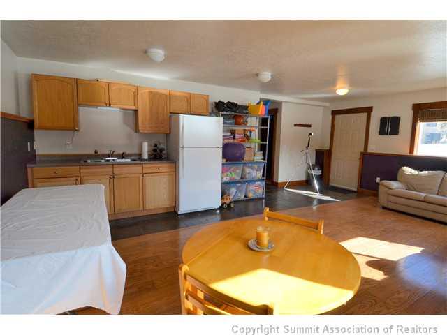 414 Big Elk Road Dillon, CO 80435 - Photo 18 of 25 a living room with furniture pool table and a lamp