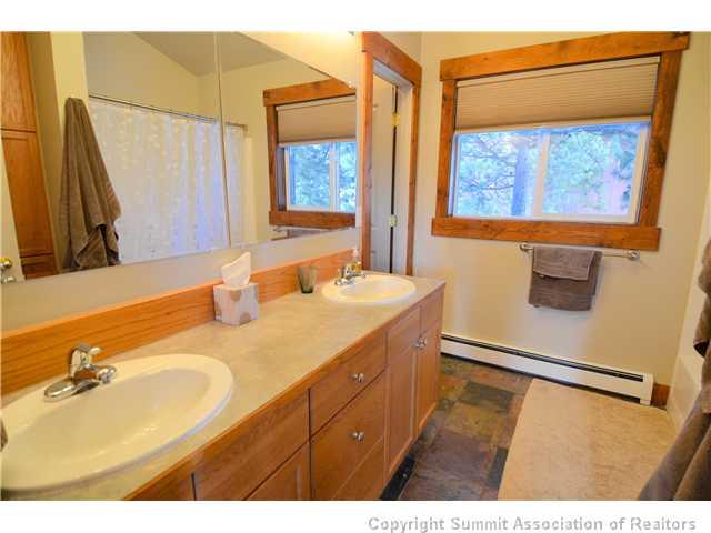 414 Big Elk Road Dillon, CO 80435 - Photo 6 of 25 a bathroom with a sink and a mirror
