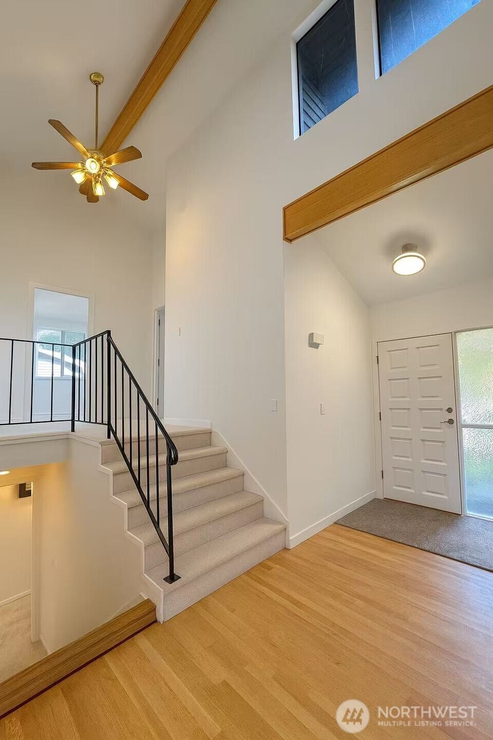 13405 Southeast 56th Place Bellevue, WA 98006 - Photo 15 of 38 a view of a livingroom with wooden floor