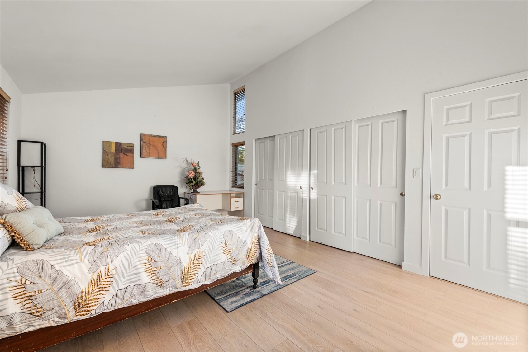 13405 Southeast 56th Place Bellevue, WA 98006 - Photo 18 of 38 a bedroom with a bed and a table