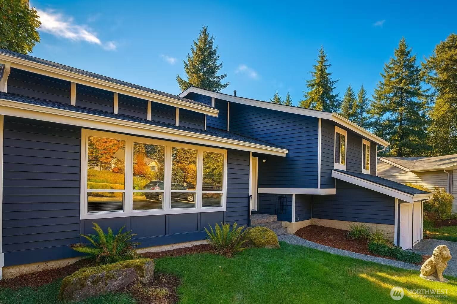 13405 Southeast 56th Place Bellevue, WA 98006 - Photo 2 of 38 a front view of a house with garden