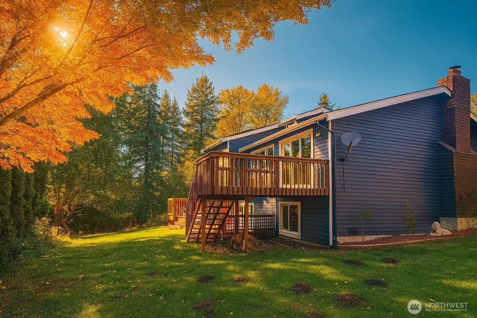 13405 Southeast 56th Place Bellevue, WA 98006 - Photo 4 of 38 a view of a house with backyard and a tree