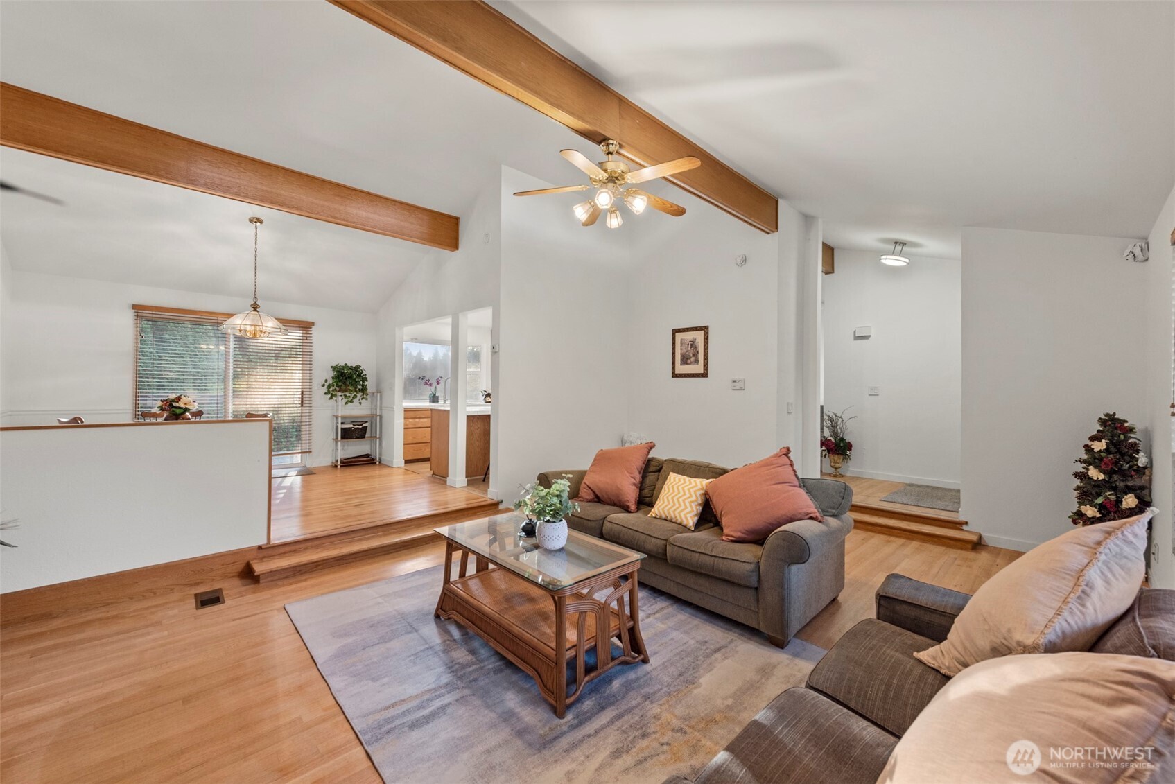 13405 Southeast 56th Place Bellevue, WA 98006 - Photo 6 of 38 a living room with furniture and wooden floor
