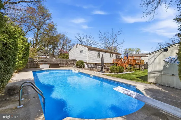 a view of outdoor space and swimming pool