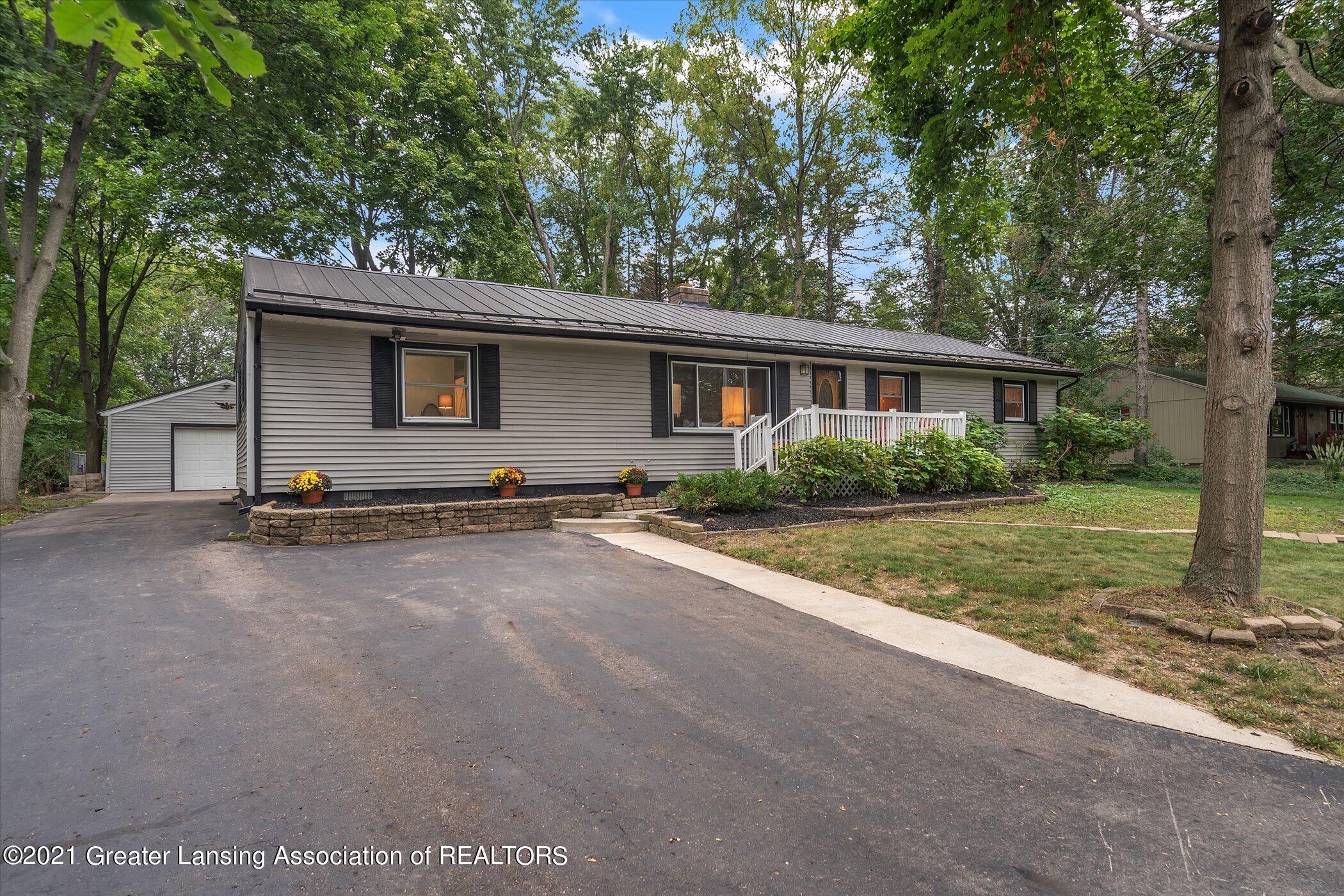 2821 North Aurelius Road Lansing, MI 48910 - Photo 2 of 48 02-2821 Aurelius Rd-Windowstill-Real-Est