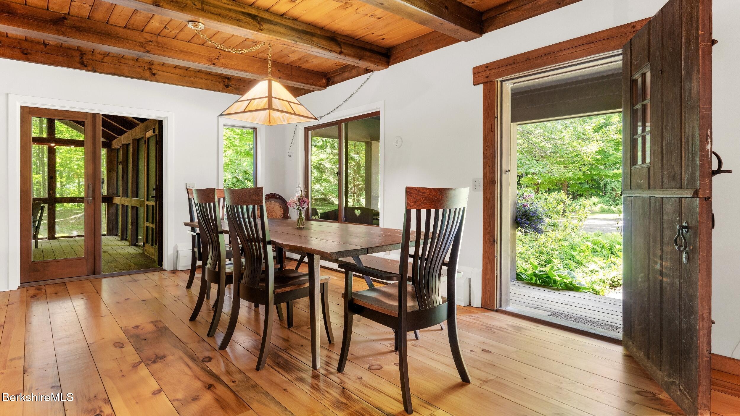 173 Hillsdale Road Egremont, MA 01230 - Photo 39 of 82 a view of a dining room with furniture window and wooden floor