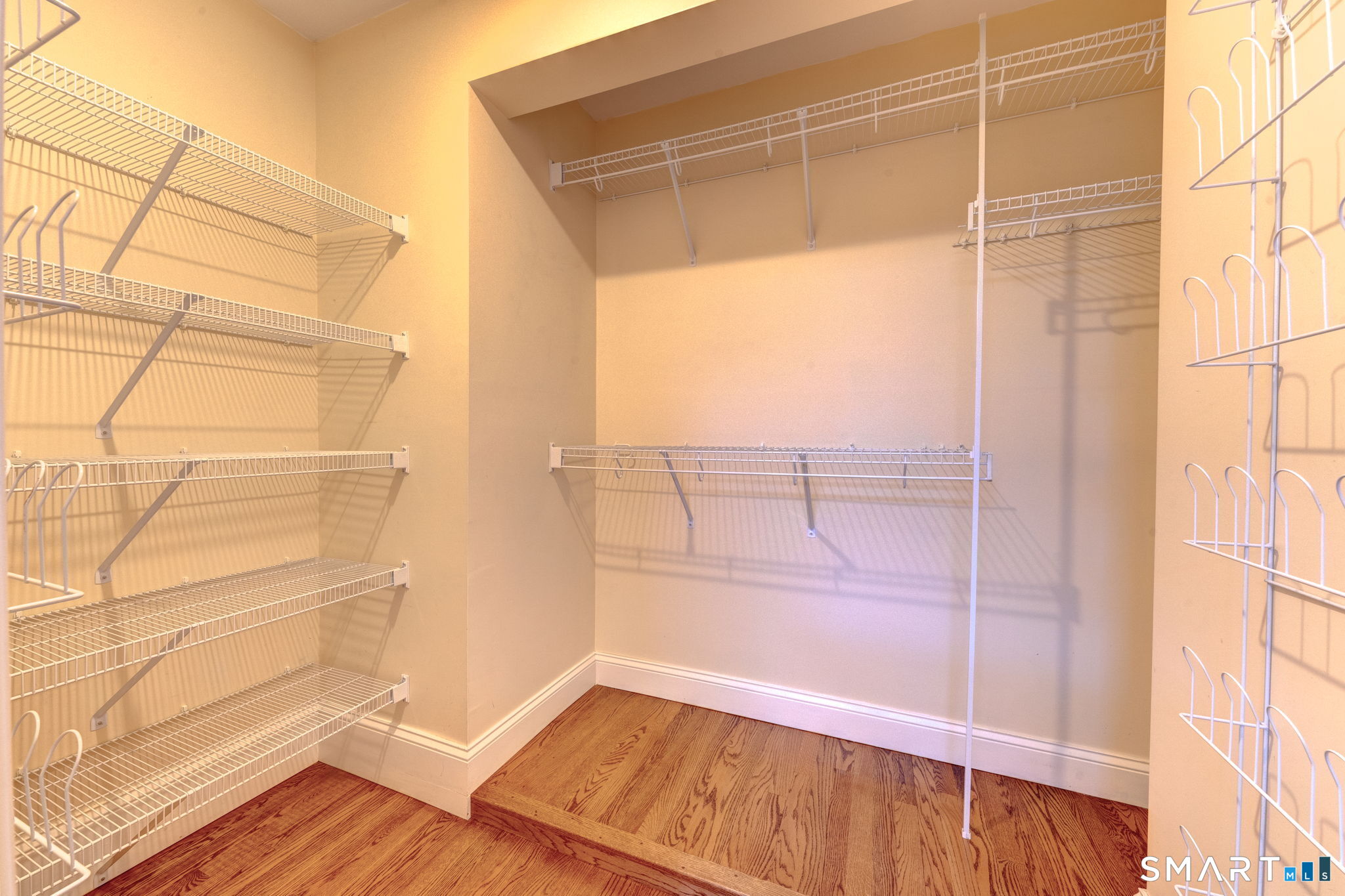 353 Warrenville Road Mansfield, CT 06250 - Photo 27 of 40 a view of a room with wooden floor and windows