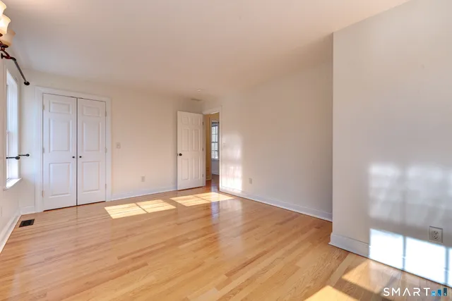 a view of an empty room and window