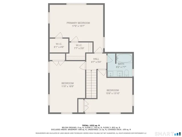 a picture of a bench in front of a wall