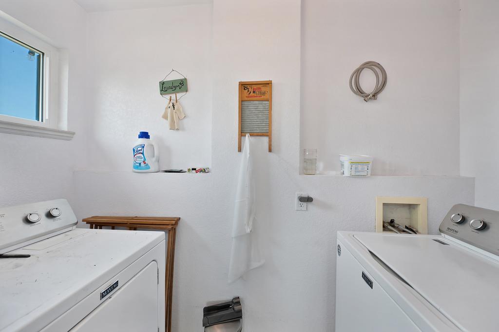 3641 Catlett Road Pleasant Grove, CA 95668 - Photo 19 of 29 a view of storage and utility room with washer and dryer