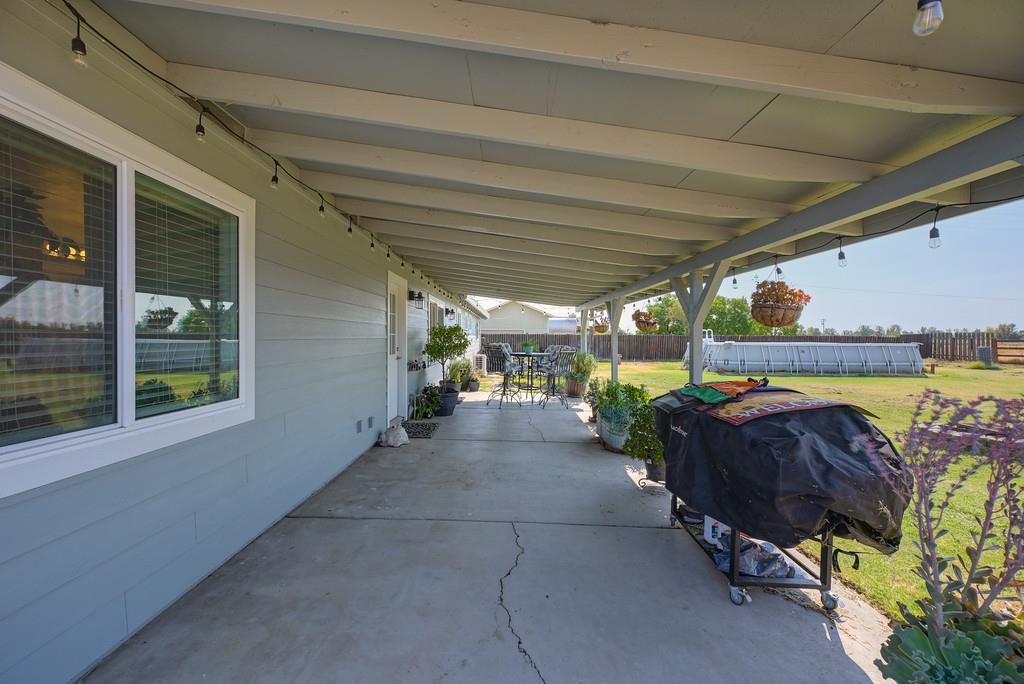 3641 Catlett Road Pleasant Grove, CA 95668 - Photo 23 of 29 a view of a patio with table and chairs