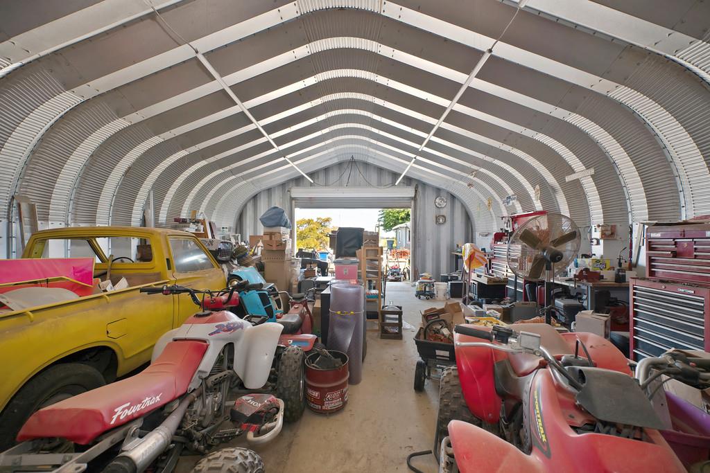 3641 Catlett Road Pleasant Grove, CA 95668 - Photo 25 of 29 a living room with a couch and a chandelier