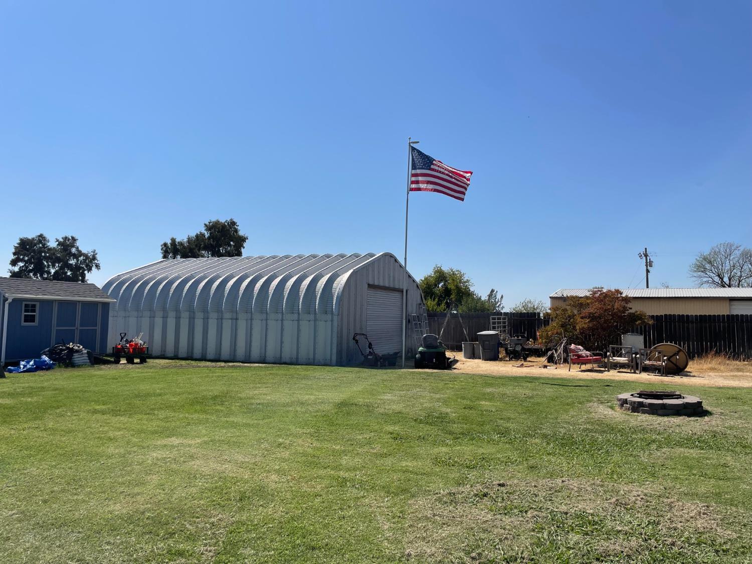 3641 Catlett Road Pleasant Grove, CA 95668 - Photo 28 of 29 a view of a house with a yard and sitting area