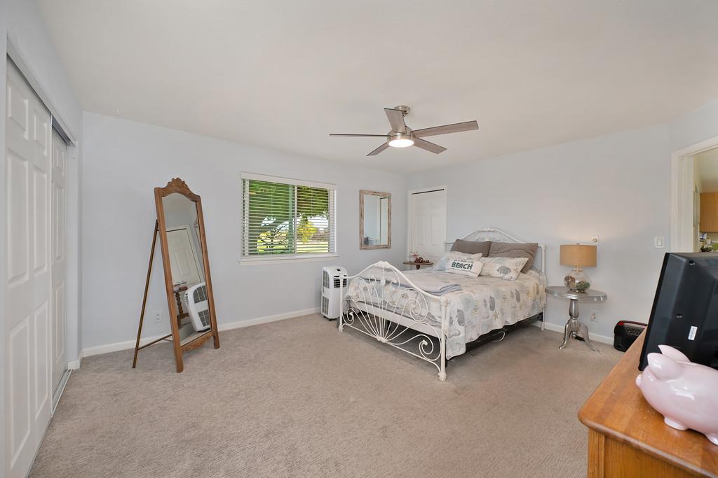 3641 Catlett Road Pleasant Grove, CA 95668 - Photo 5 of 29 a bed room with a bed and a window