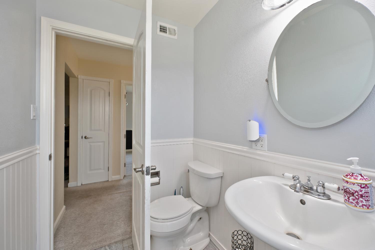 3641 Catlett Road Pleasant Grove, CA 95668 - Photo 8 of 29 a bathroom with a sink and a mirror