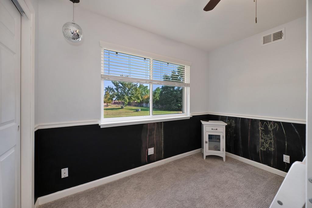 3641 Catlett Road Pleasant Grove, CA 95668 - Photo 9 of 29 a view of an empty room with a window