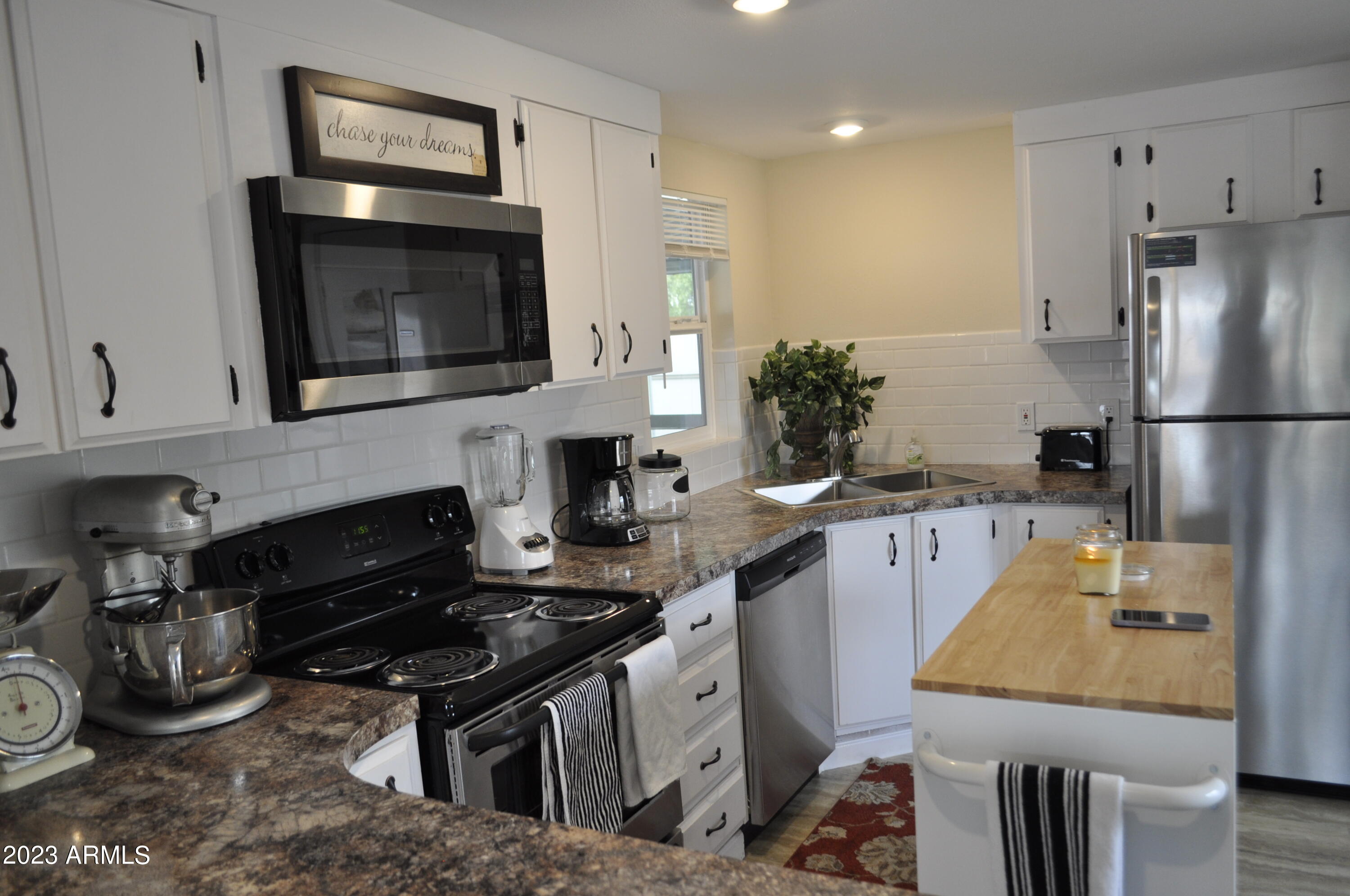 2523 East Contention Mine Road, Unit 44 Phoenix, AZ 85032 - Photo 9 of 25 KITCHEN 1