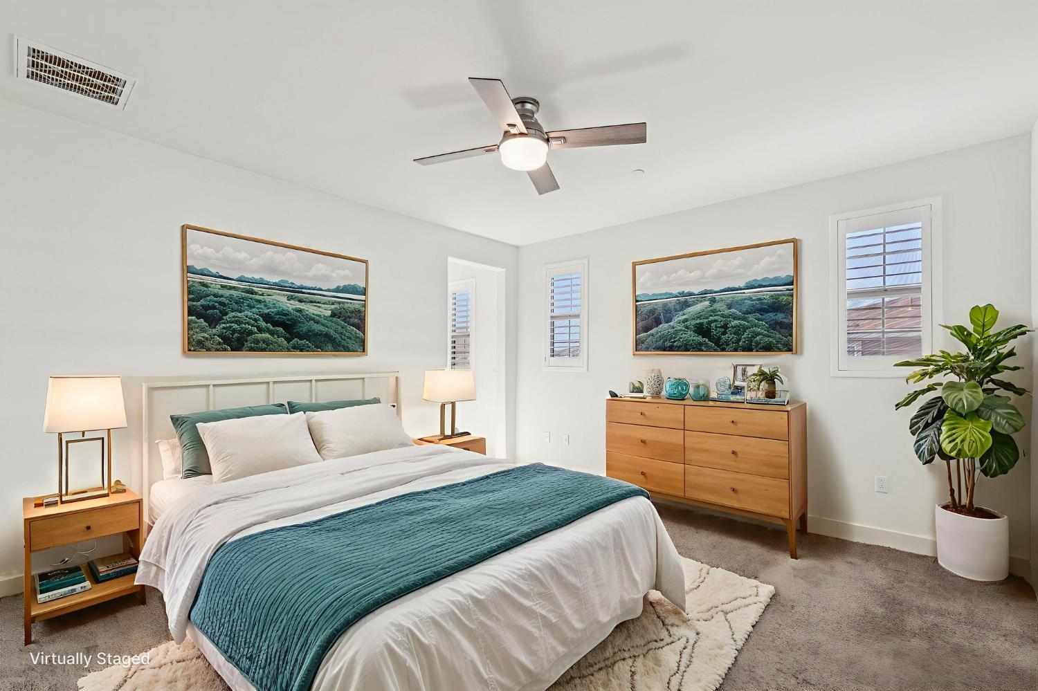 10458 Oboe Way Elk Grove, CA 95757 - Photo 18 of 38 a bedroom with a bed potted plant on the dresser and a window