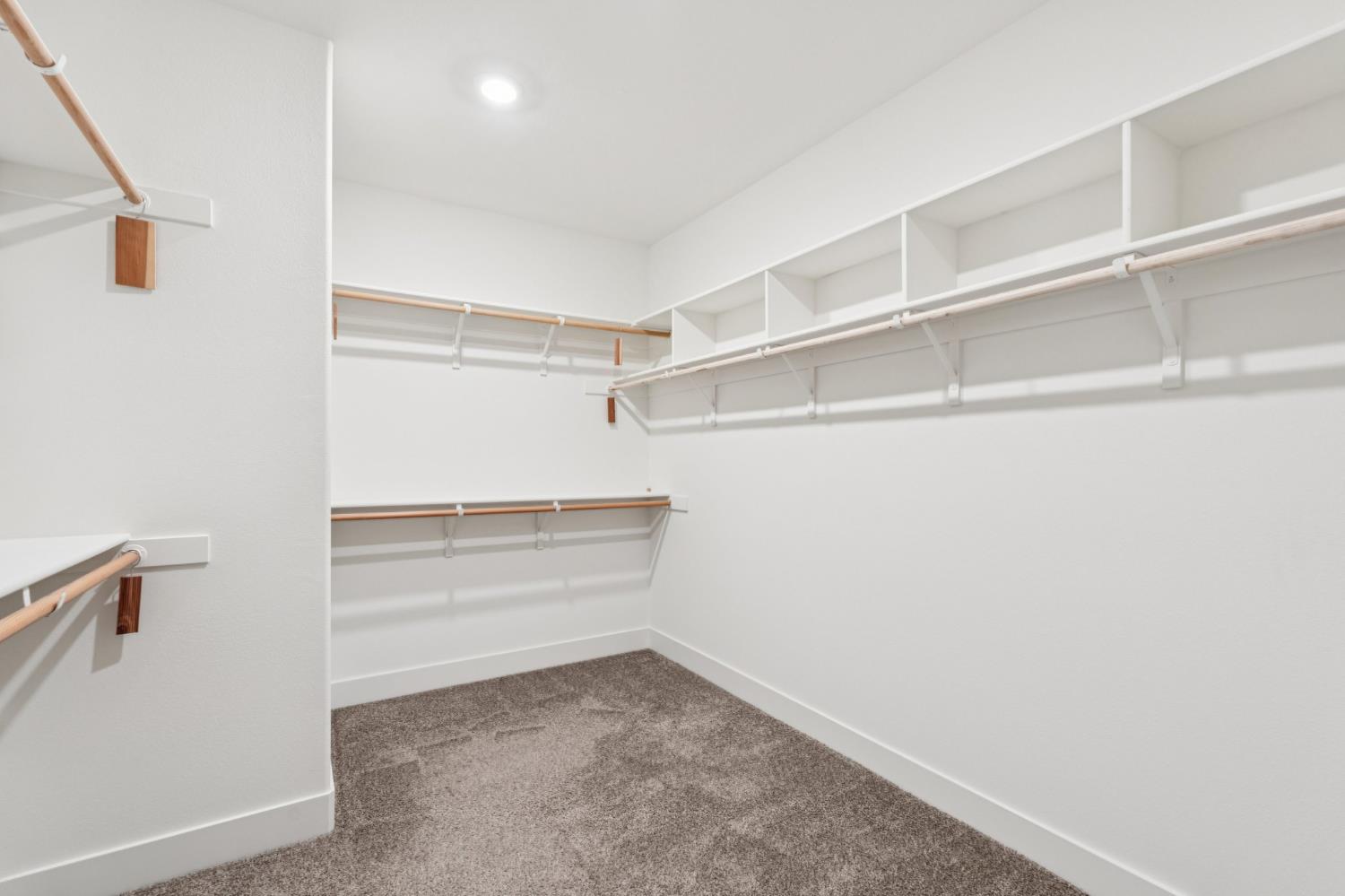 10458 Oboe Way Elk Grove, CA 95757 - Photo 24 of 38 a view of an empty walk in closet