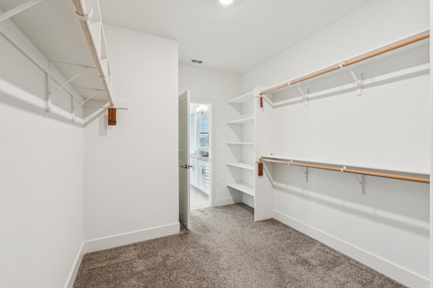 10458 Oboe Way Elk Grove, CA 95757 - Photo 25 of 38 a view of walk in closet