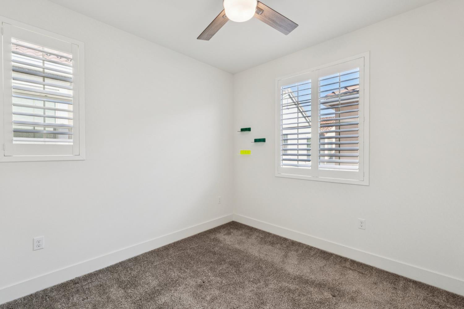10458 Oboe Way Elk Grove, CA 95757 - Photo 30 of 38 an empty room with a window